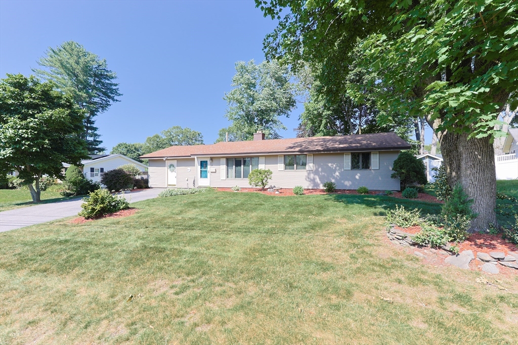 18 Paxton Road Framingham, MA 01701 - Photo 2 of 37 a front view of a house with a yard