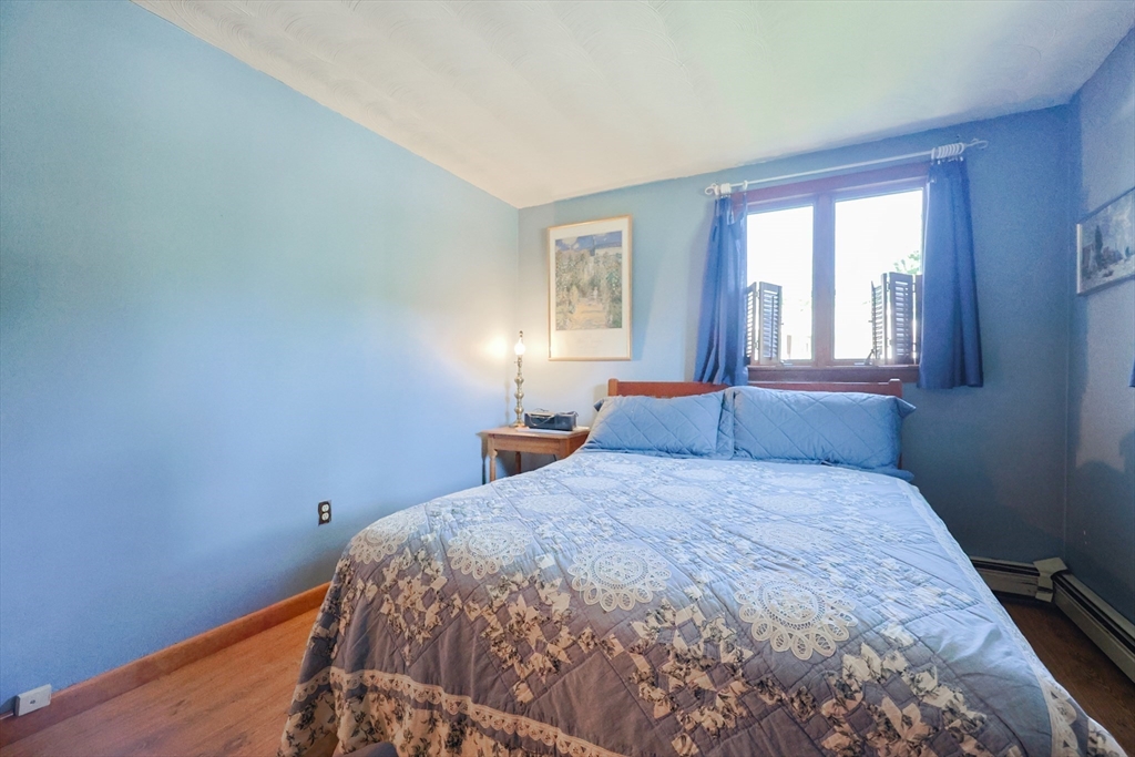 18 Paxton Road Framingham, MA 01701 - Photo 25 of 37 a bedroom with a bed and window