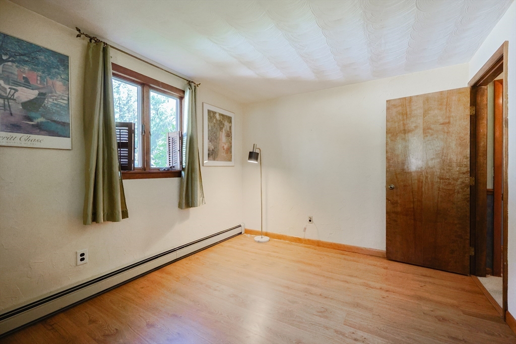 18 Paxton Road Framingham, MA 01701 - Photo 27 of 37 a view of an empty room with a window