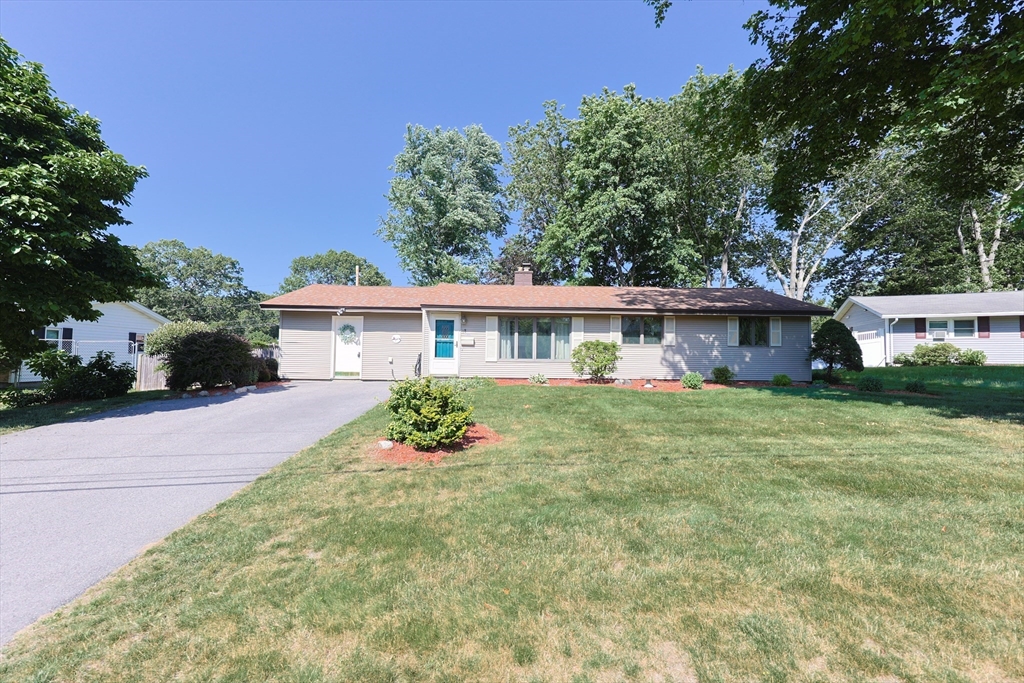 18 Paxton Road Framingham, MA 01701 - Photo 3 of 37 front view of a house with a yard