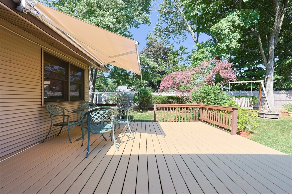 18 Paxton Road Framingham, MA 01701 - Photo 31 of 37 a view of balcony with wooden floor and outdoor seating