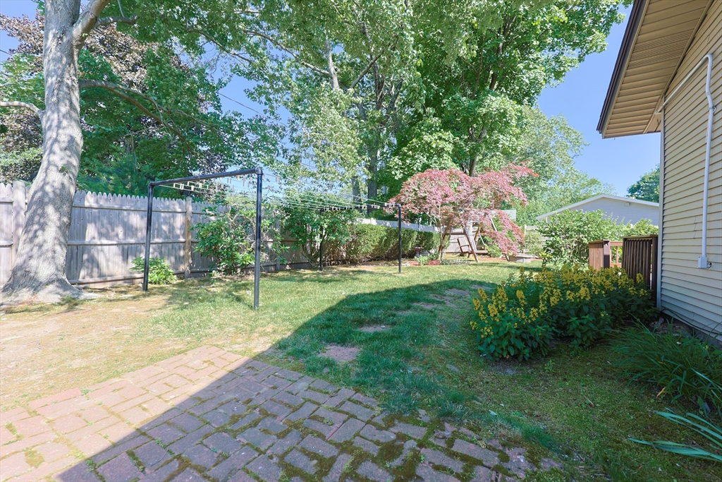 18 Paxton Road Framingham, MA 01701 - Photo 33 of 37 a view of a backyard with garden and plants