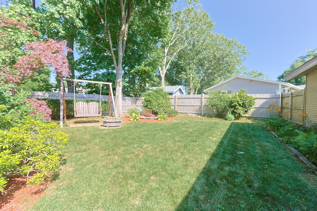 18 Paxton Road Framingham, MA 01701 - Photo 34 of 37 a view of a backyard with a garden and plants