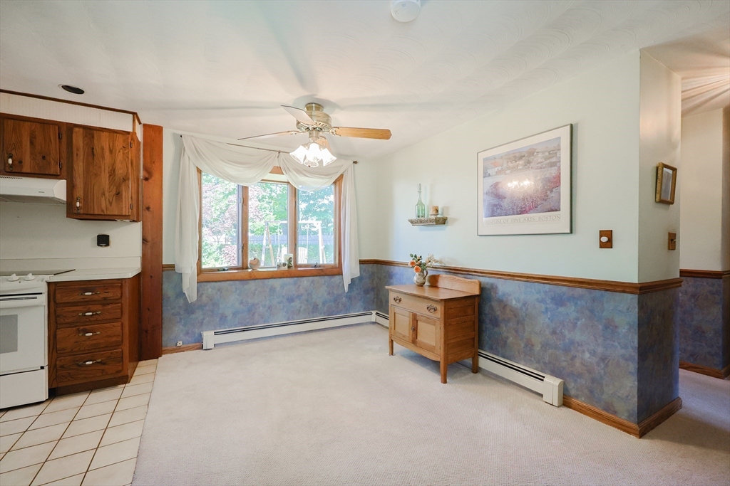 18 Paxton Road Framingham, MA 01701 - Photo 9 of 37 a spacious bedroom with a bed and a dresser