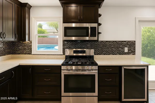 a sink with a sink and cabinets