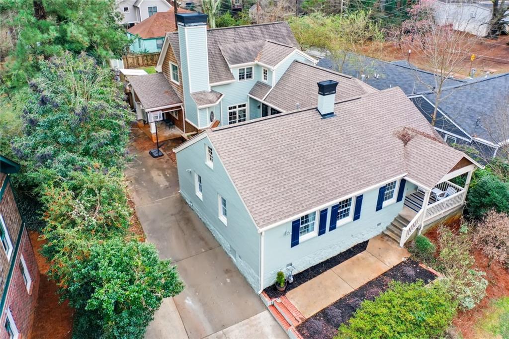 Incredible space in this modest facade. Note the large addition on the rear of the home.