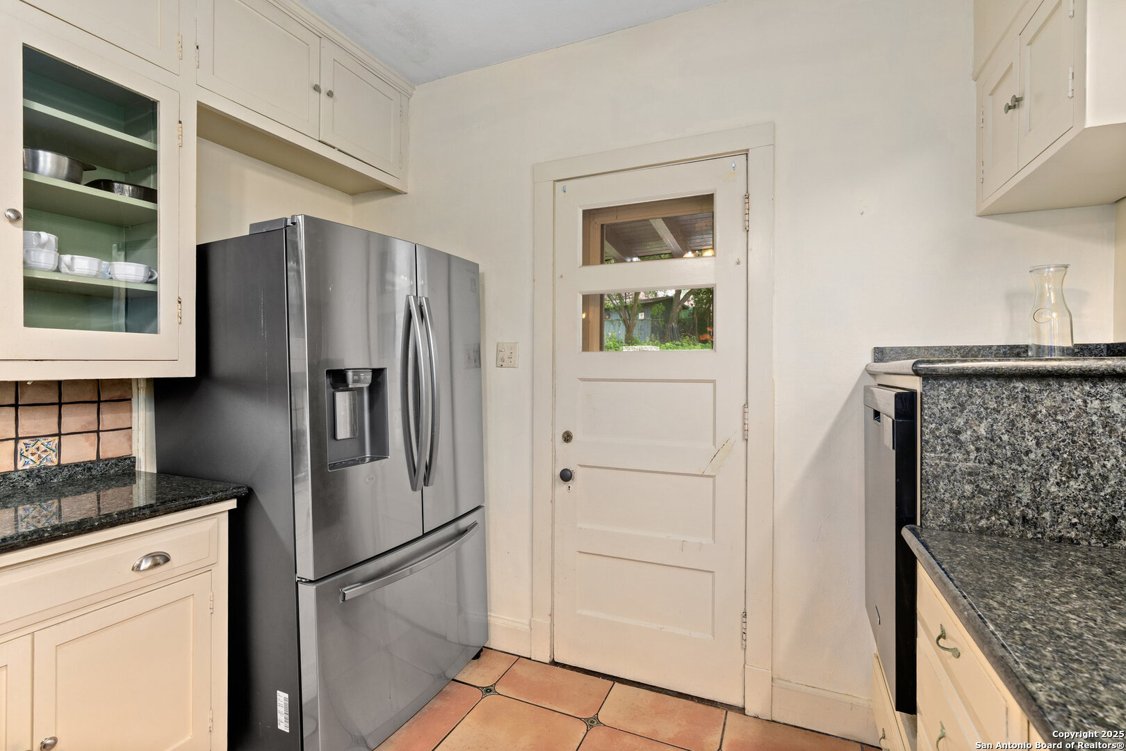5351 Fredericksburg Road San Antonio, TX 78229 - Photo 22 of 50 a kitchen with stainless steel appliances granite countertop a refrigerator and a stove