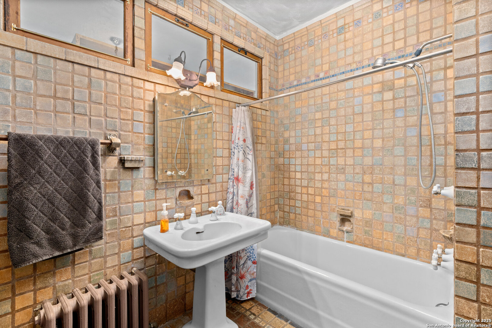 5351 Fredericksburg Road San Antonio, TX 78229 - Photo 23 of 50 a bathroom with a sink a bathtub and shower
