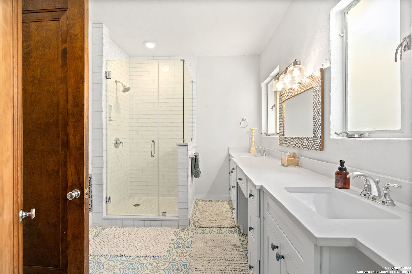 5351 Fredericksburg Road San Antonio, TX 78229 - Photo 27 of 50 a bathroom with a sink and a mirror