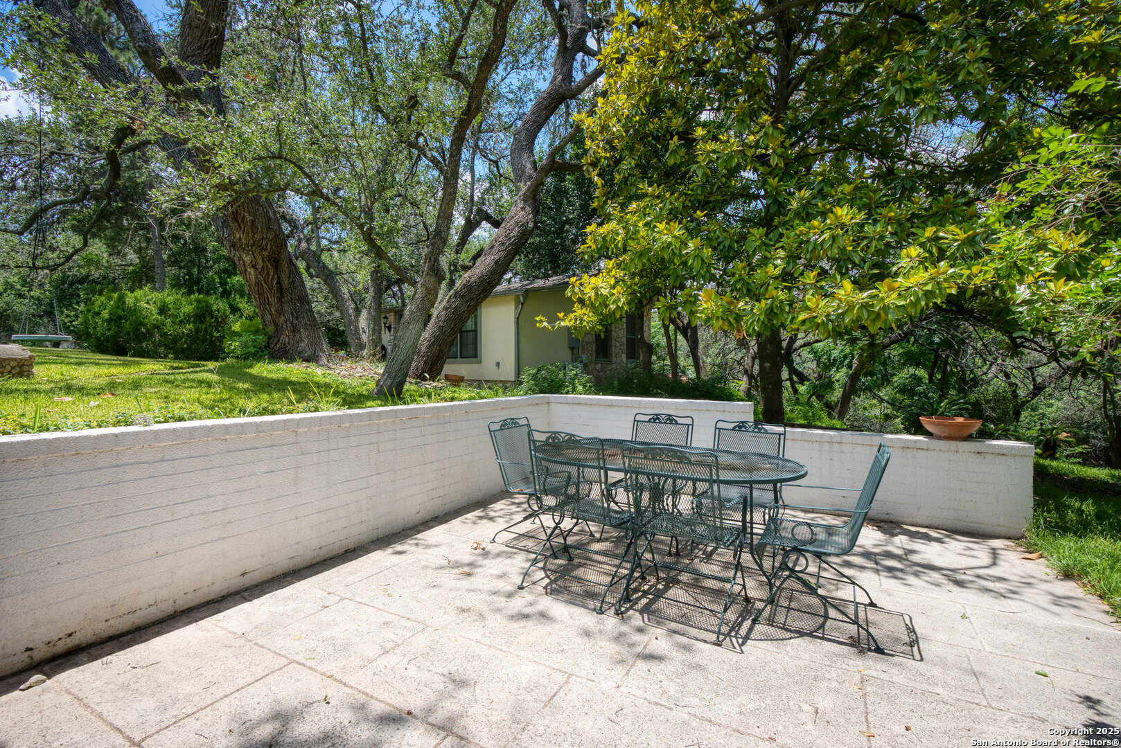 5351 Fredericksburg Road San Antonio, TX 78229 - Photo 33 of 50 a view of a patio with a table and chairs