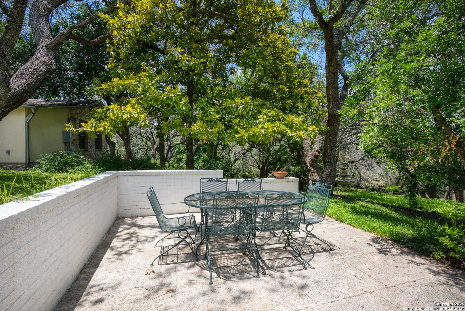 5351 Fredericksburg Road San Antonio, TX 78229 - Photo 34 of 50 a view of a patio with a table and chairs