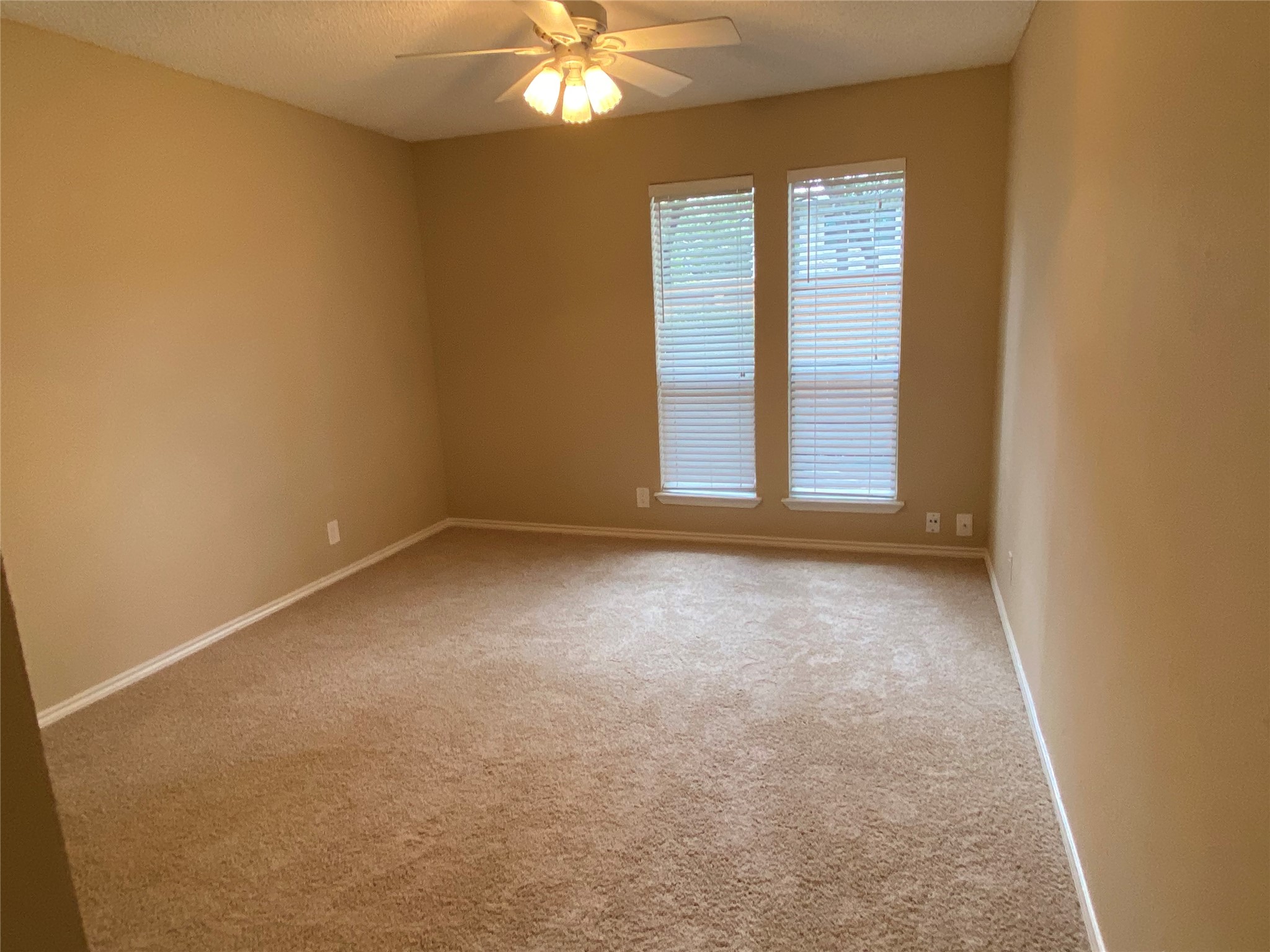 7922 Ridgeline North Austin, TX 78759 - Photo 19 of 31 2nd Bedroom overlooking courtyard