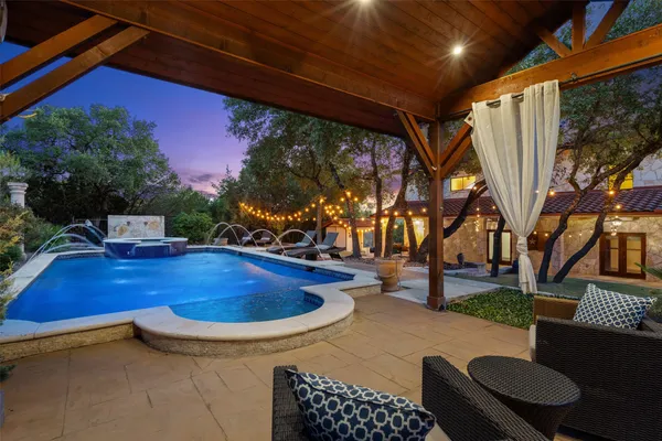 a view of a patio with a yard