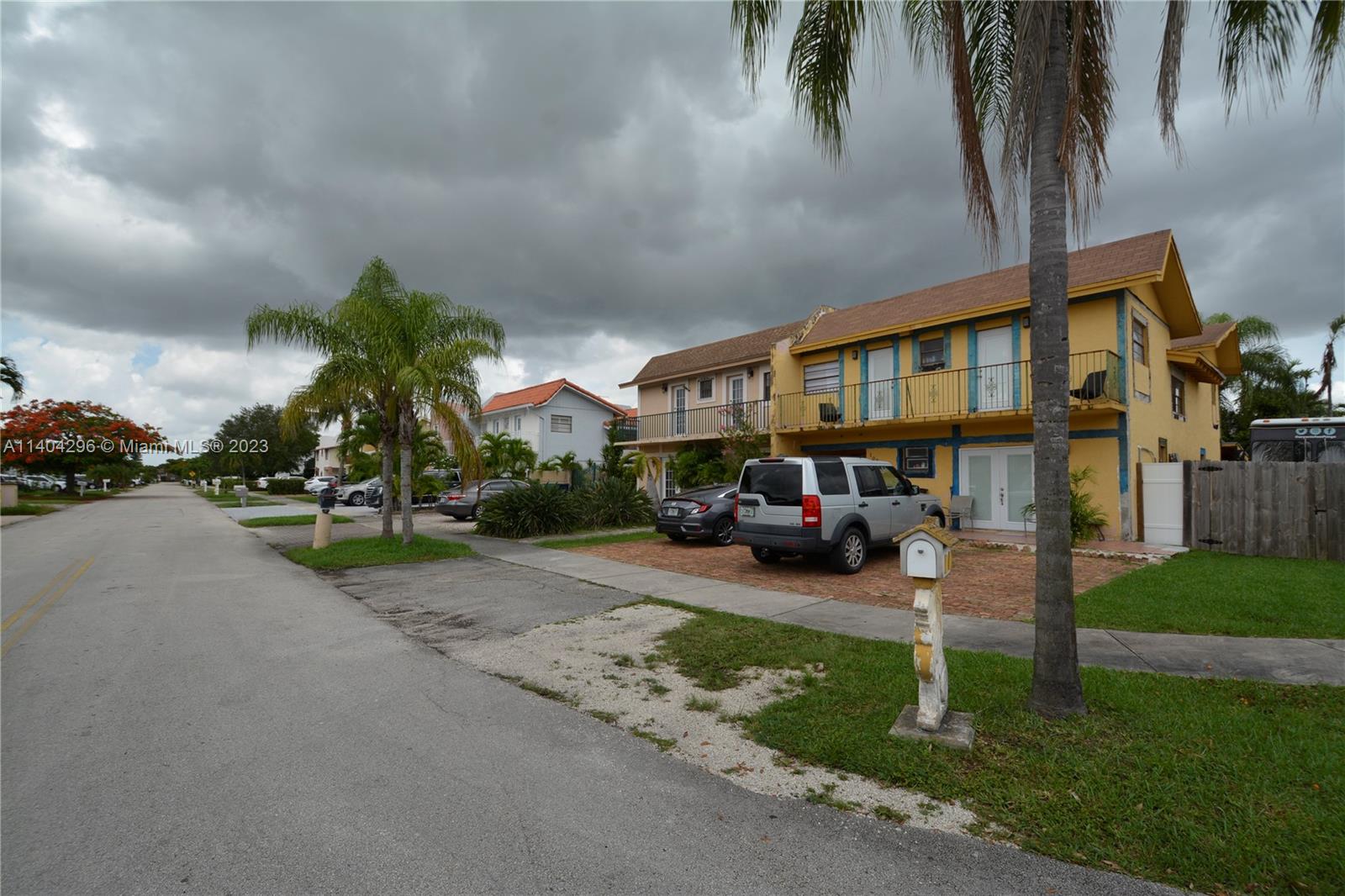 10915 Southwest 25th Street, Unit 2 Miami, FL 33165 - Photo 28 of 28 a house view with a garden space