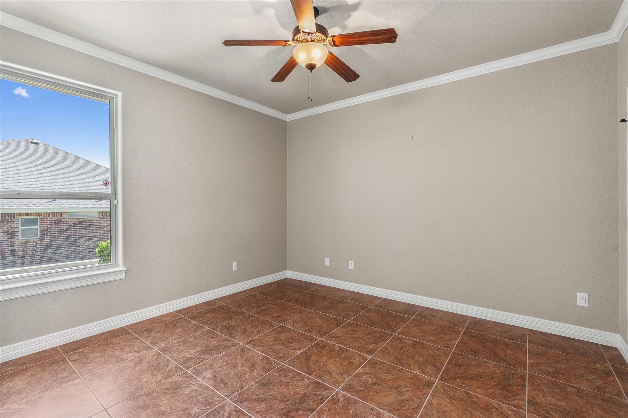 8006 Ridgeway Court Nolanville, TX 76559 - Photo 31 of 40 Empty room featuring ceiling fan and ornamental molding