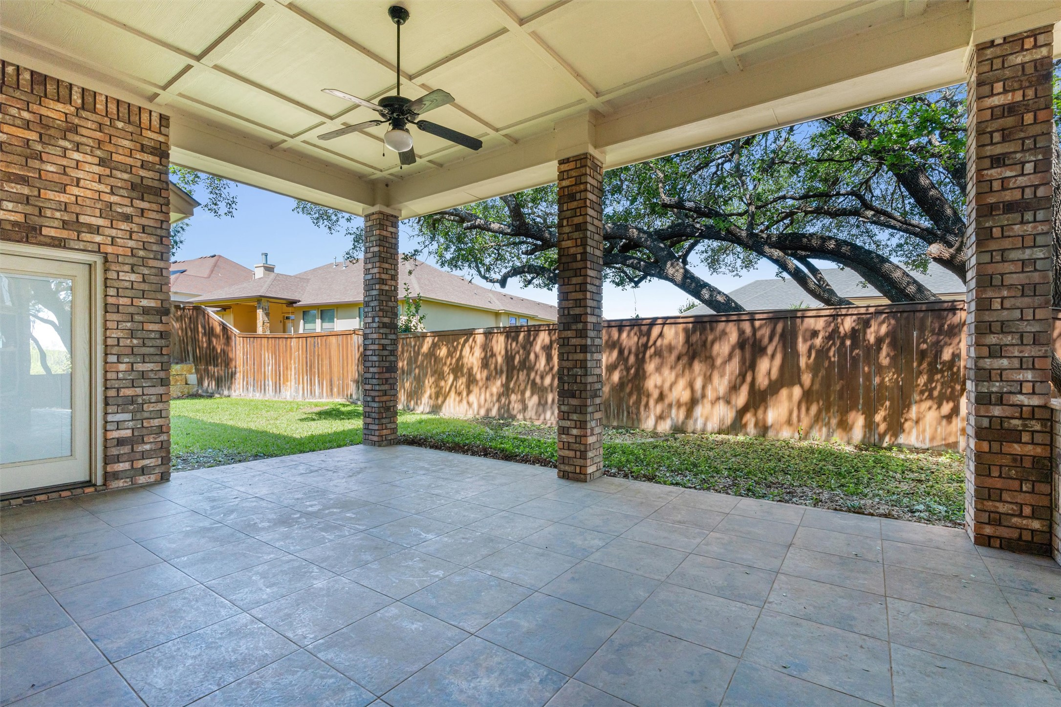 8006 Ridgeway Court Nolanville, TX 76559 - Photo 37 of 40 Fenced backyard with a ceiling fan and a patio