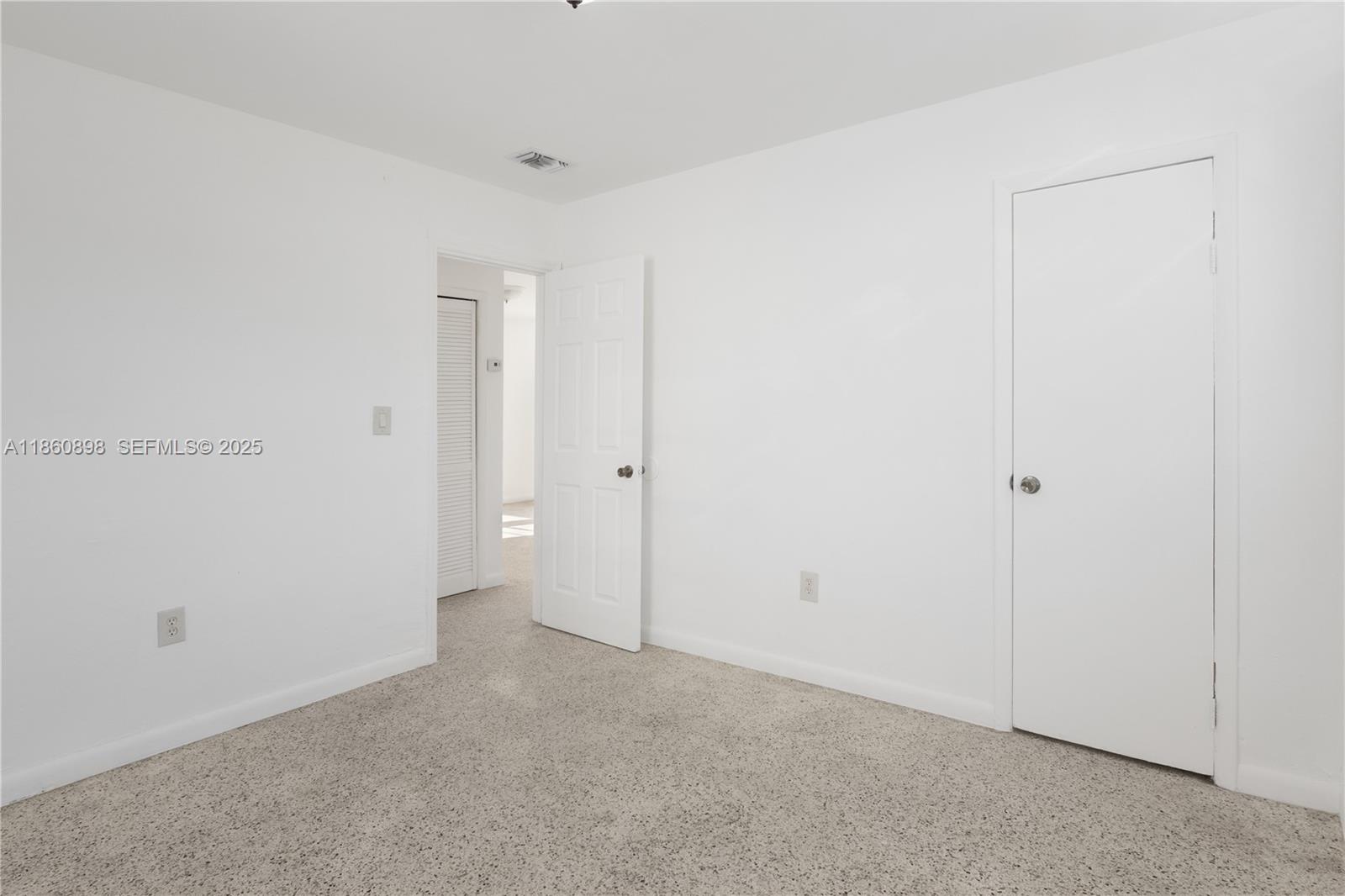 1251 Northwest 59th Street, Unit 3 Miami, FL 33142 - Photo 11 of 22 a view of an empty room