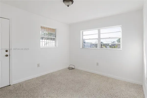 an empty room with a window