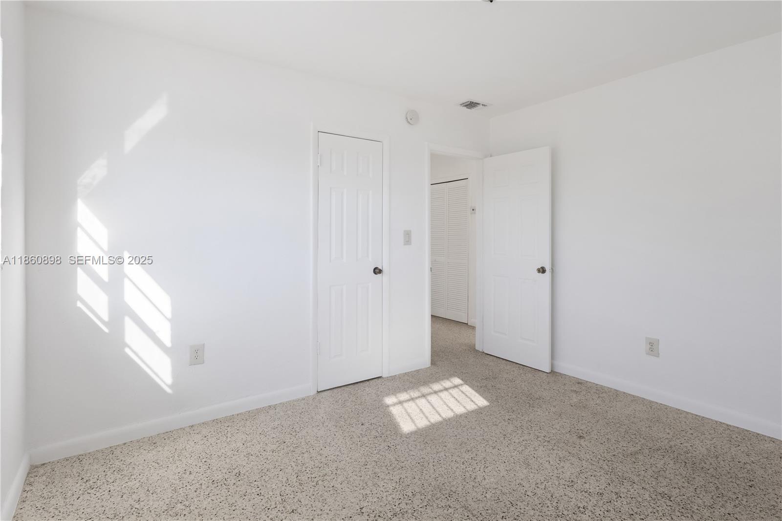 1251 Northwest 59th Street, Unit 3 Miami, FL 33142 - Photo 14 of 22 a view of empty room