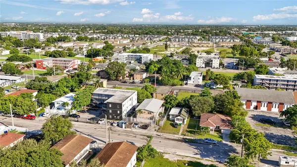 an aerial view of a city with lots of residential buildings