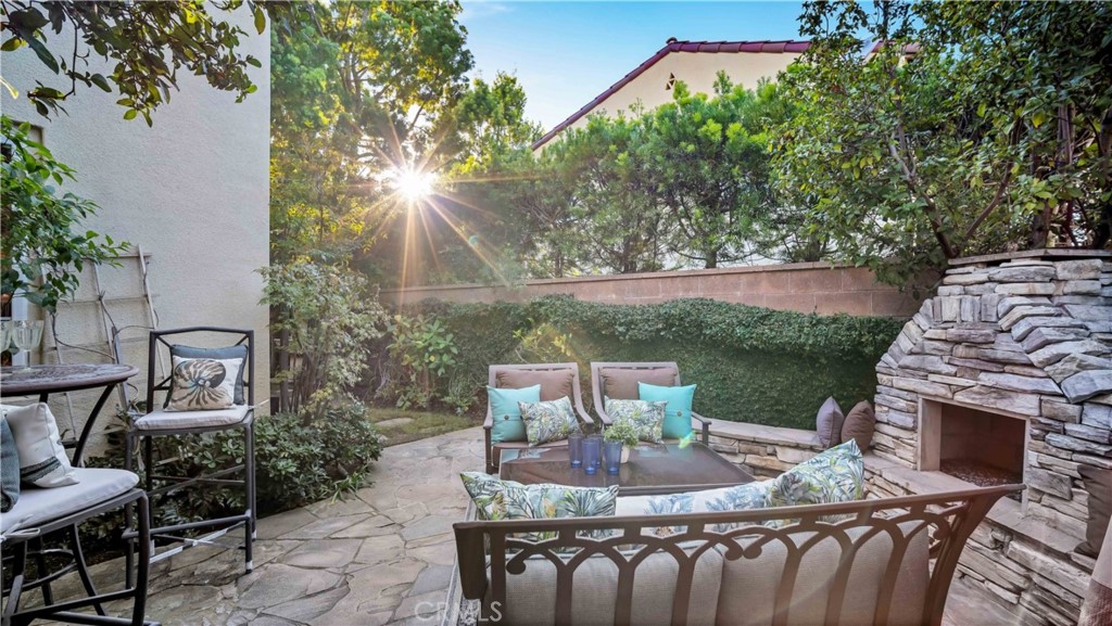 55 Bower Tree Irvine, CA 92603 - Photo 11 of 29 a front view of a house with garden and patio