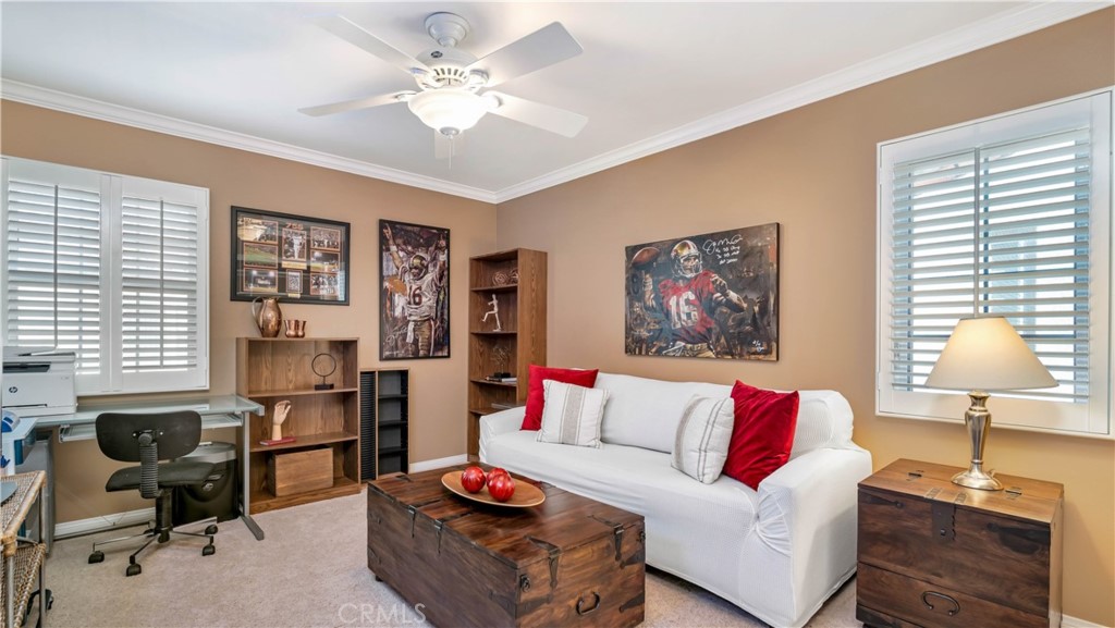 55 Bower Tree Irvine, CA 92603 - Photo 14 of 29 a living room with furniture and a lamp
