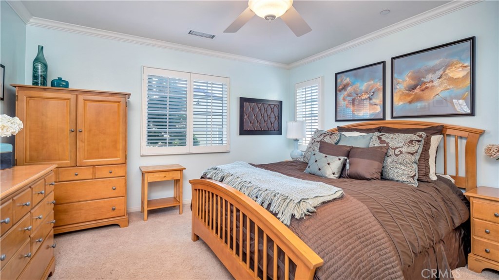 55 Bower Tree Irvine, CA 92603 - Photo 16 of 29 a bedroom with a bed and a window