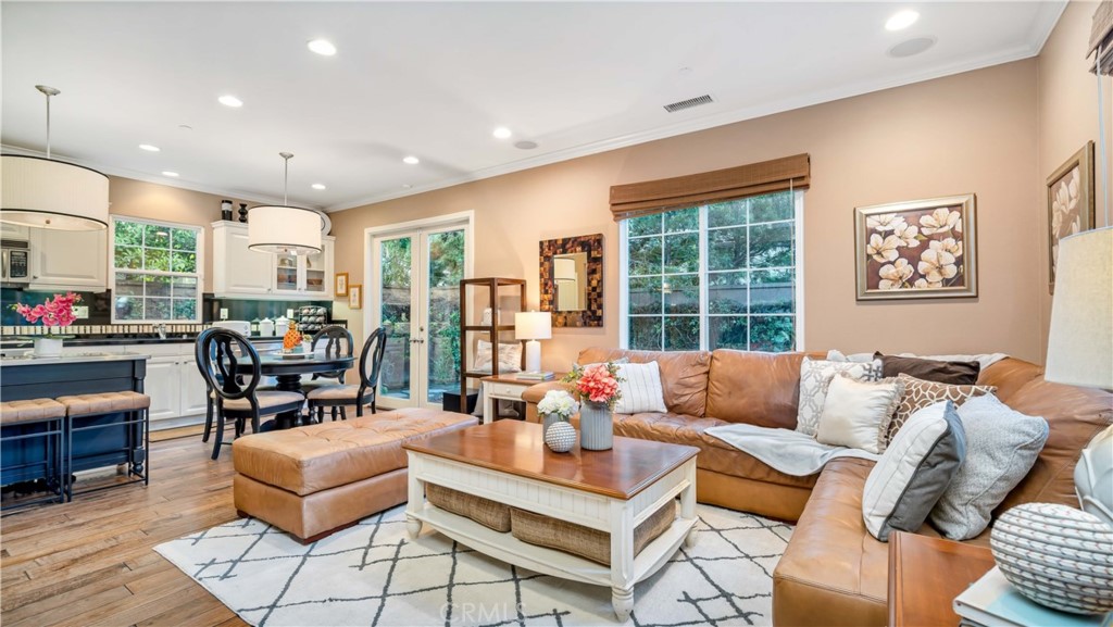 55 Bower Tree Irvine, CA 92603 - Photo 21 of 29 a living room with furniture and a large window