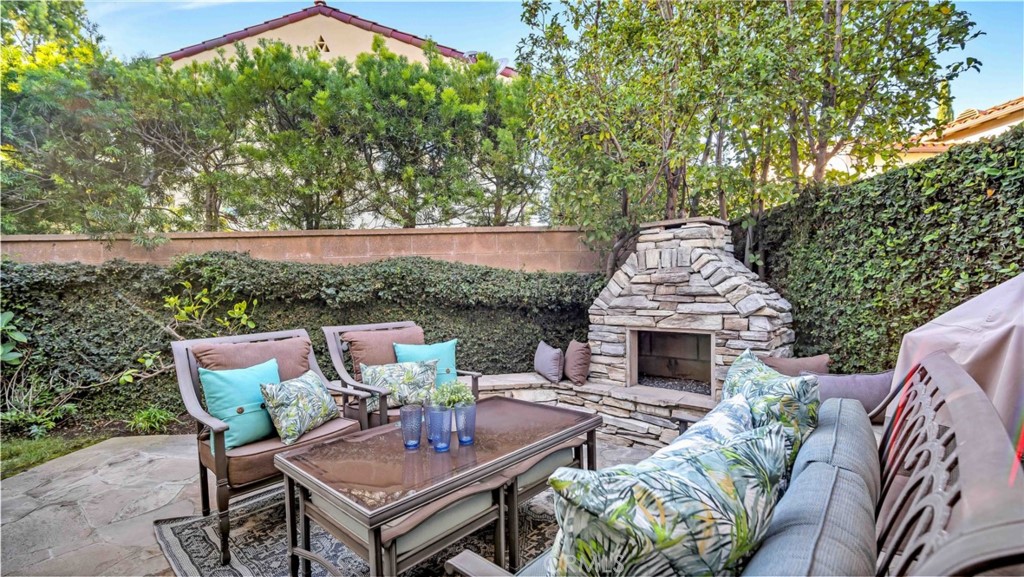 55 Bower Tree Irvine, CA 92603 - Photo 9 of 29 aerial view of a patio with couches table and chairs and potted plants