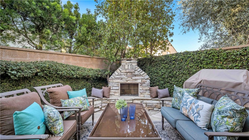 55 Bower Tree Irvine, CA 92603 - Photo 10 of 29 an aerial view of a house with outdoor seating and trees