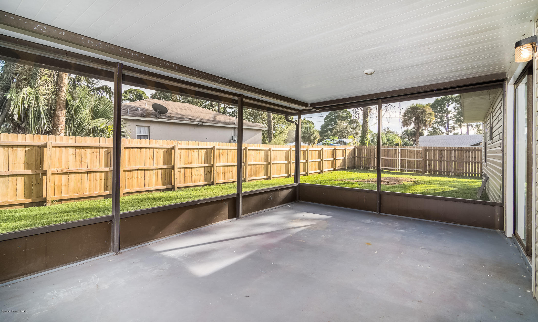 5579 Holden Road Cocoa, FL 32927 - Photo 12 of 14 Screened Patio