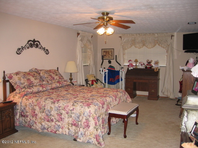 7711 Stillwell Road Jacksonville, FL 32221 - Photo 29 of 34 Master Bedroom