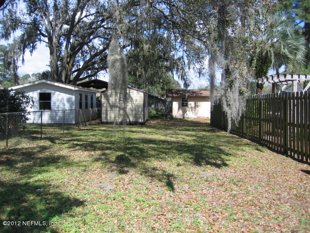 7711 Stillwell Road Jacksonville, FL 32221 - Photo 5 of 34 Side yard