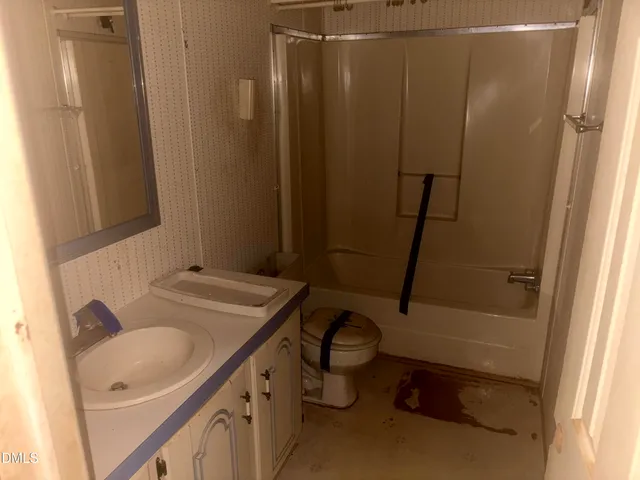 a bathroom with a sink and a tub