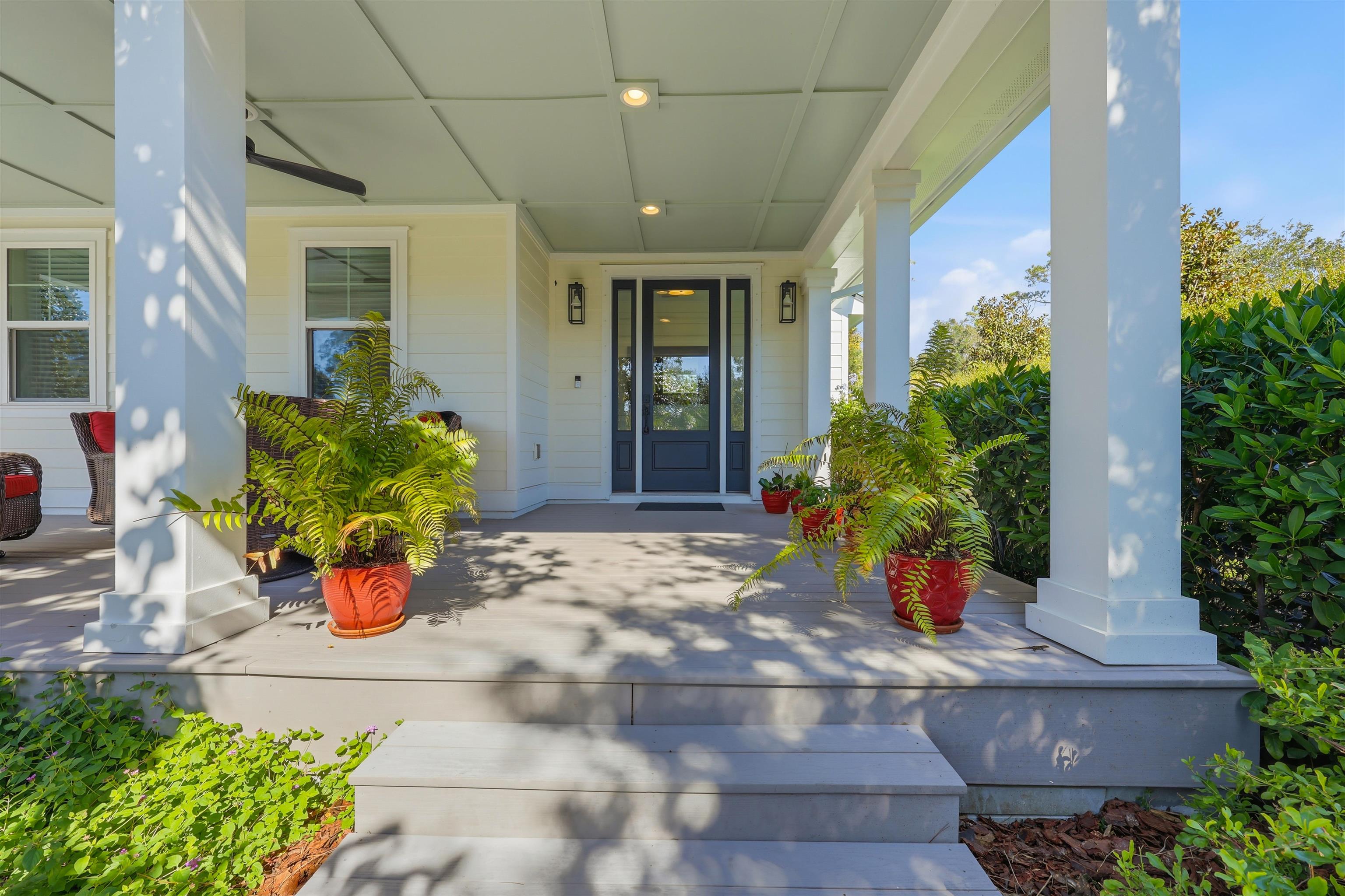 66 Ridgeway Road St. Augustine, FL 32080 - Photo 35 of 53 a view of a entryway with flower pots