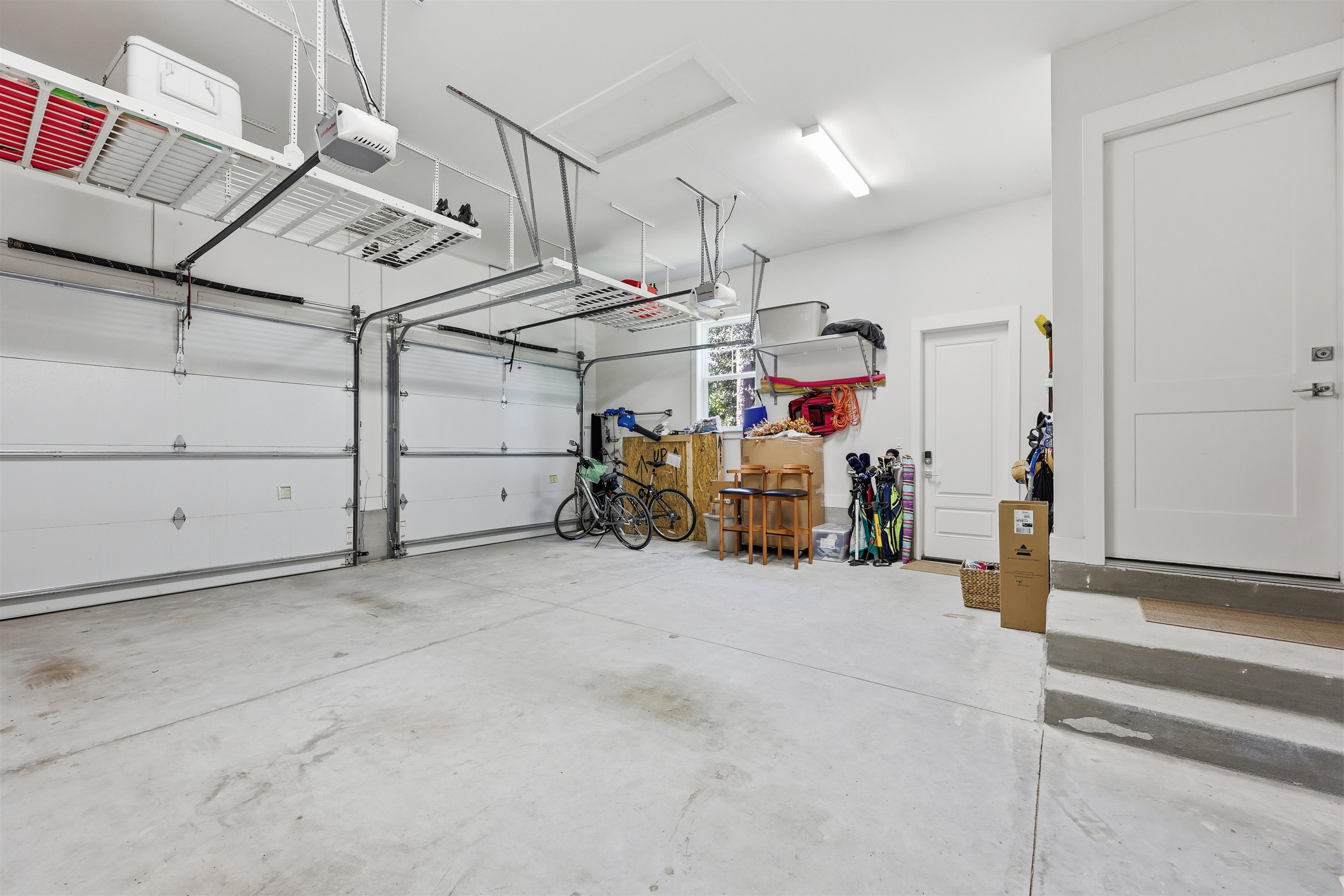 66 Ridgeway Road St. Augustine, FL 32080 - Photo 44 of 53 Garage featuring a garage door opener