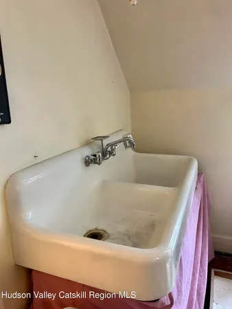 a bath tub sitting in a bathroom