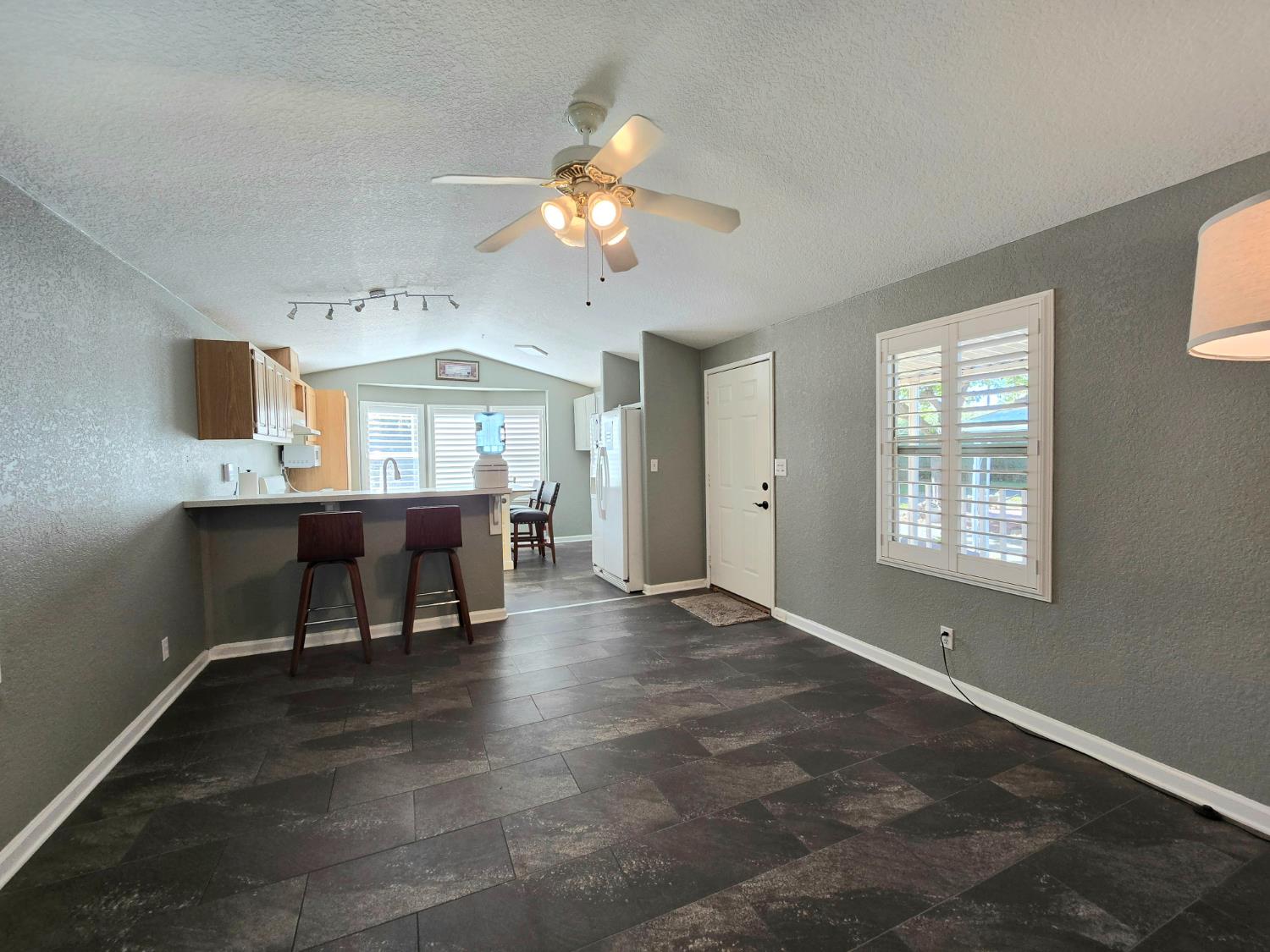 13955 West Walnut Grove Road, Unit 26 Walnut Grove, CA 95690 - Photo 12 of 29 a view of a livingroom with furniture window and wooden floor