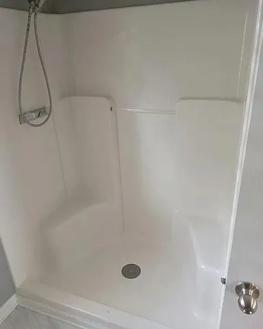 a bathroom with a bath tub
