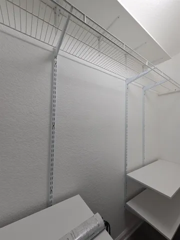 a bathroom with a shower and toilet