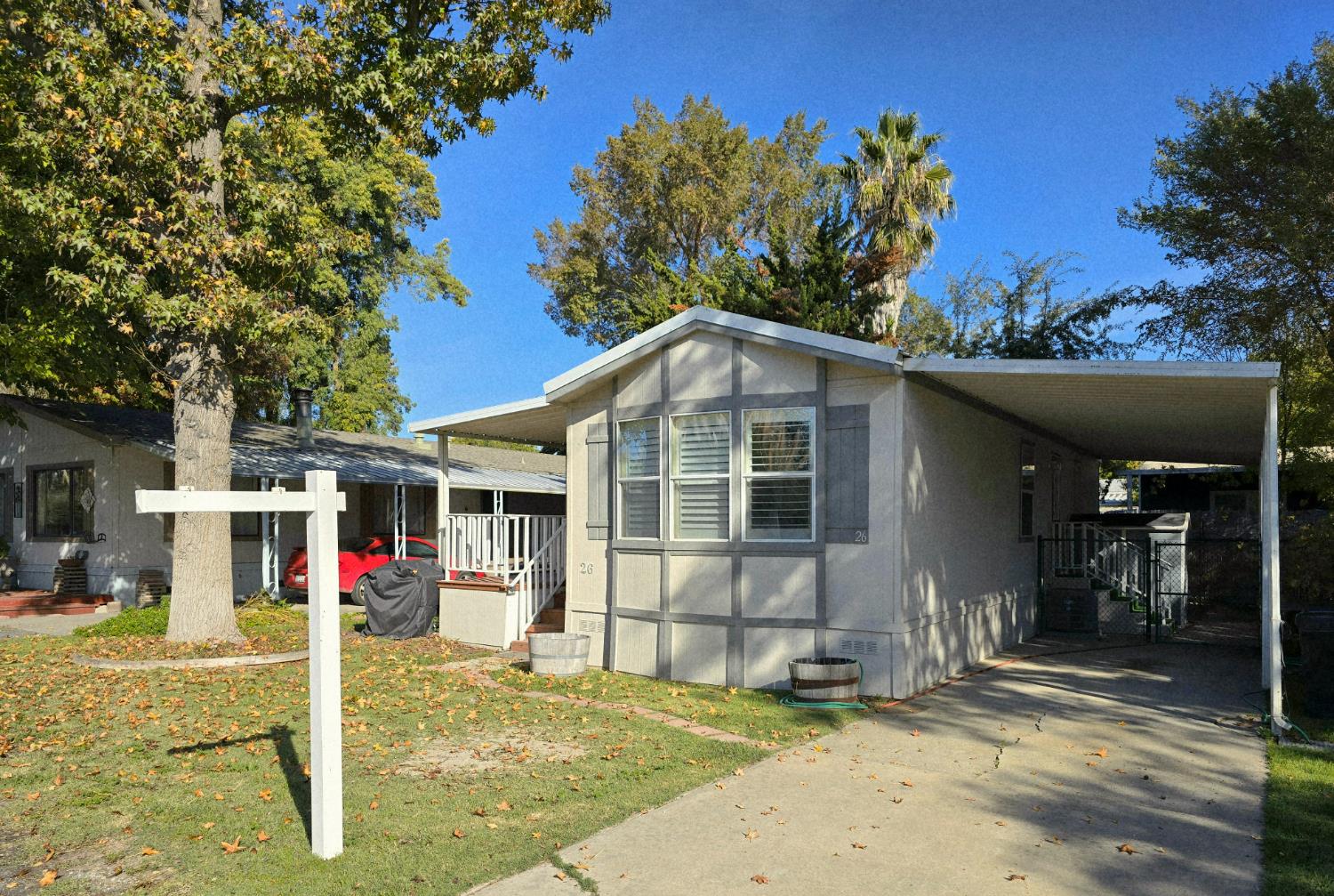 13955 West Walnut Grove Road, Unit 26 Walnut Grove, CA 95690 - Photo 29 of 29 a view of a house with a patio