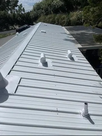 a terrace view with wooden floor and fence