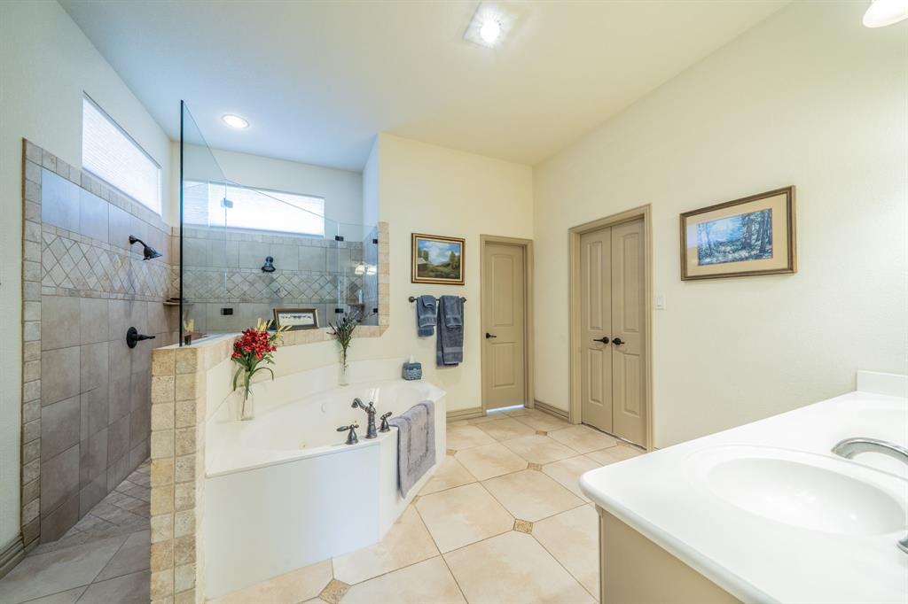 109 Overton Ridge Circle Weatherford, TX 76088 - Photo 14 of 27 walk-in shower with two shower sprays.