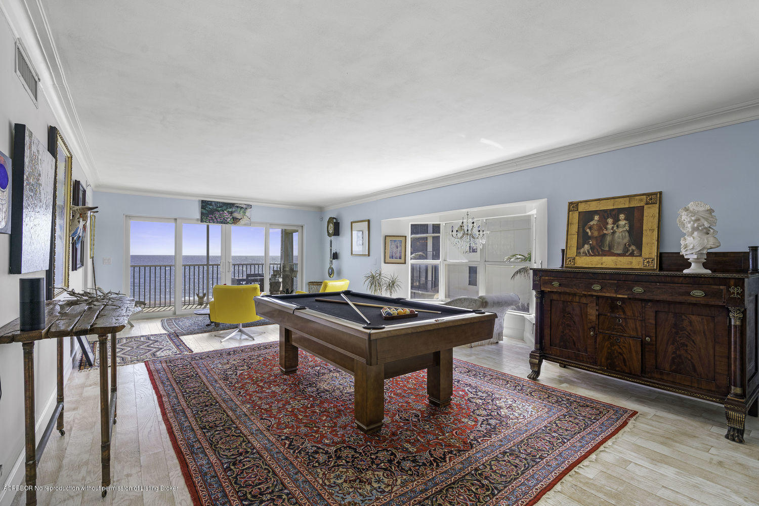 250 South Beach Road, Unit 208 Jupiter, FL 33469 - Photo 4 of 14 a living room with furniture and wooden floor