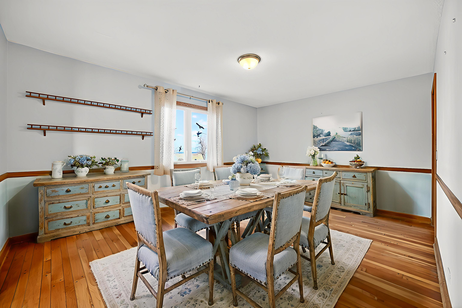 21230 Virginia Road DeKalb, IL 60115 - Photo 11 of 54 a view of a dining room with furniture window and wooden floor