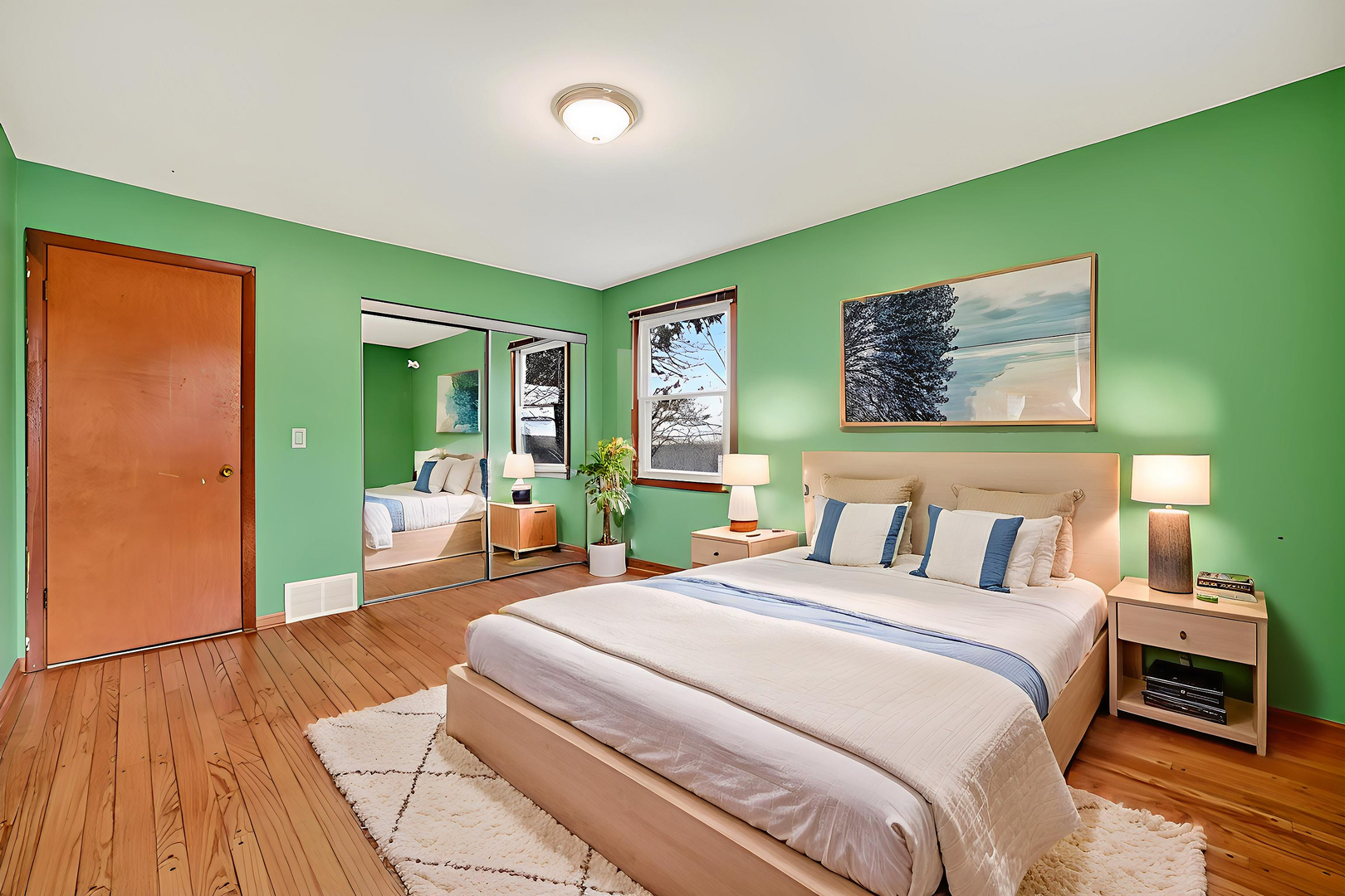 21230 Virginia Road DeKalb, IL 60115 - Photo 32 of 54 a spacious bedroom with a bed and a couch