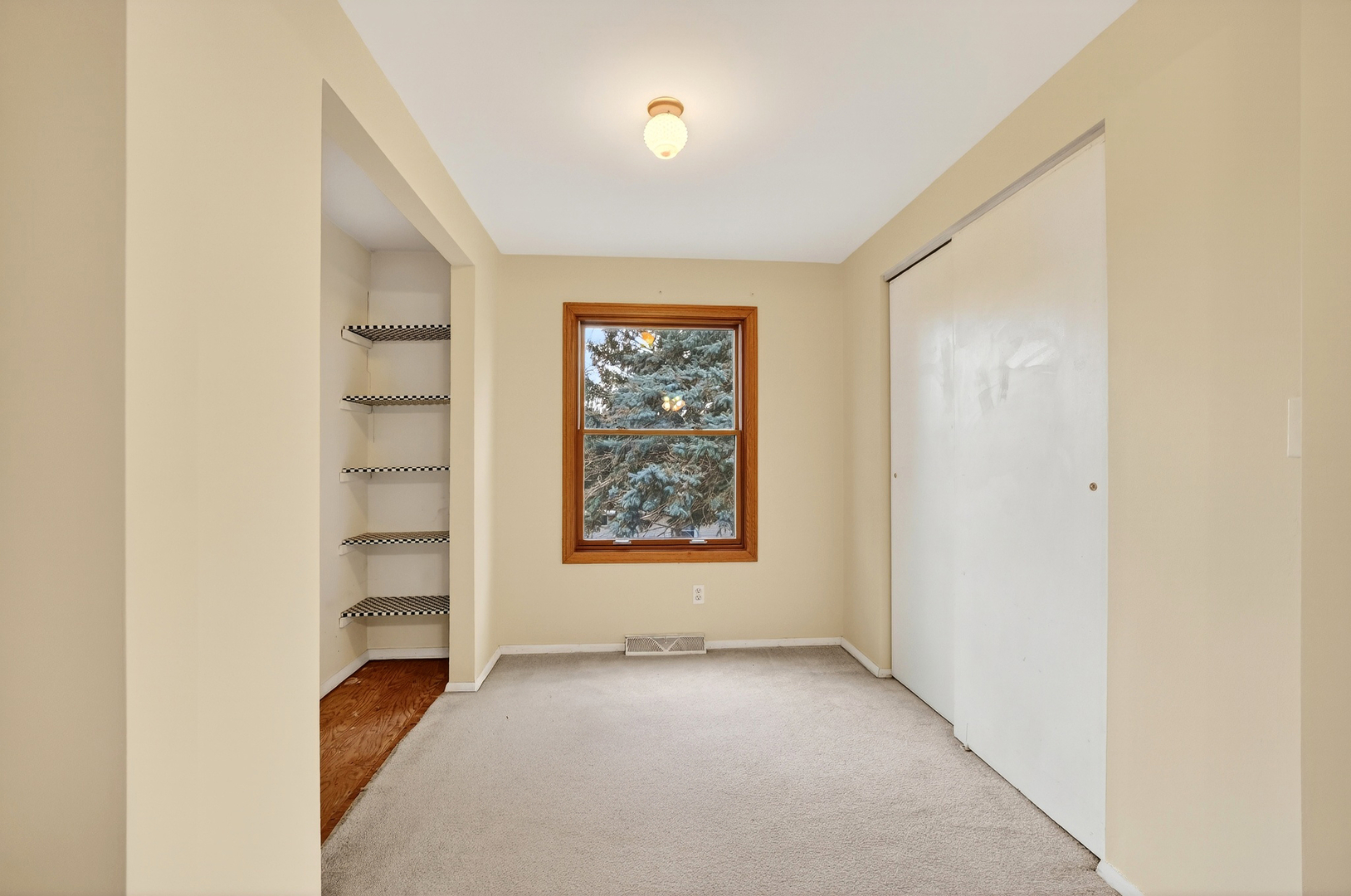 21230 Virginia Road DeKalb, IL 60115 - Photo 43 of 54 a view of an empty room with a window