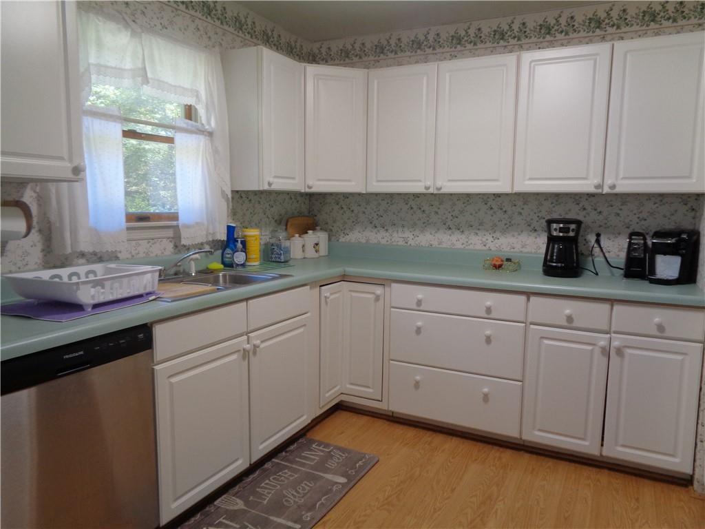 204 Gilchrist Road Uniontown, PA 15401 - Photo 14 of 22 a kitchen with white cabinets