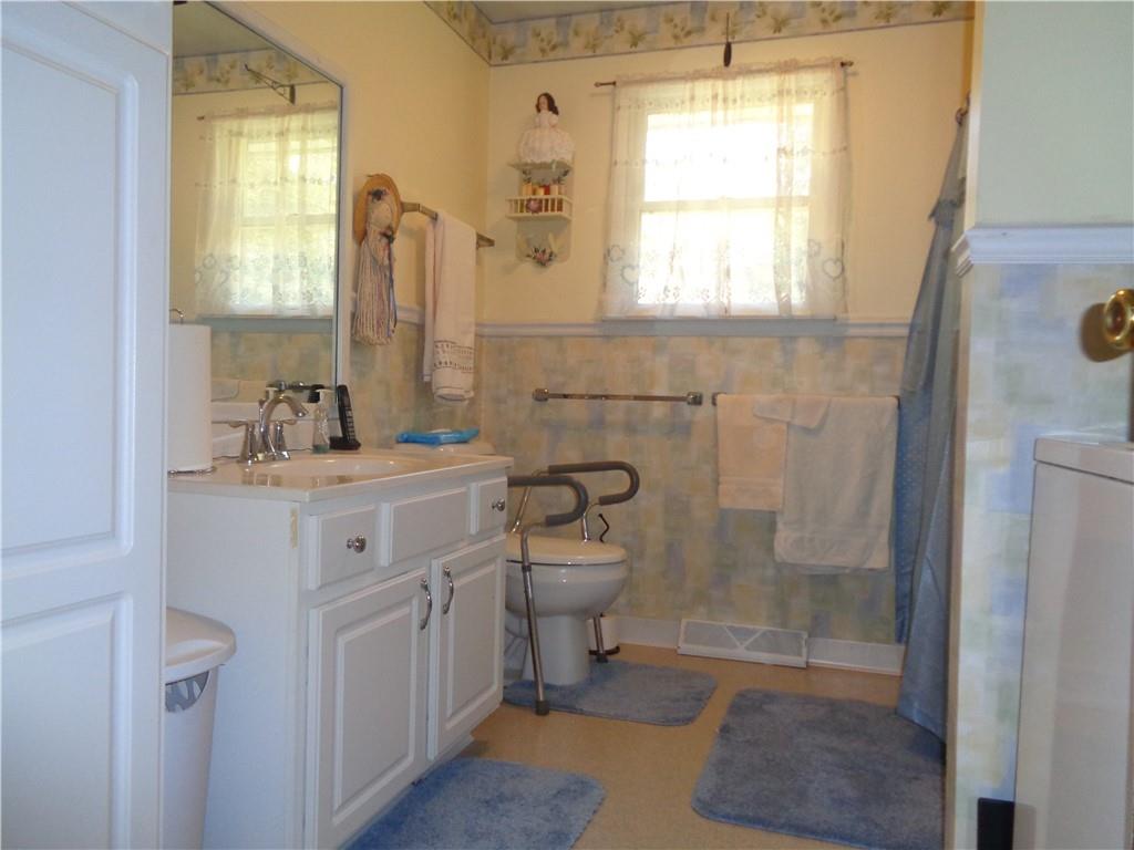 204 Gilchrist Road Uniontown, PA 15401 - Photo 21 of 22 a bathroom with a sink toilet and shower