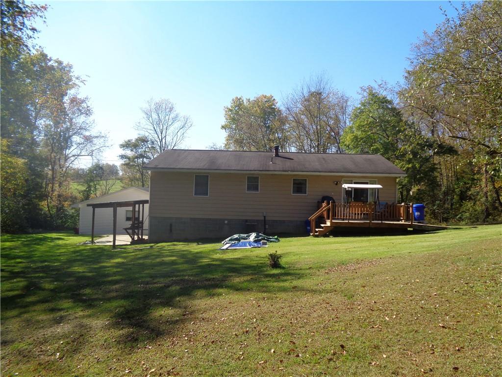 204 Gilchrist Road Uniontown, PA 15401 - Photo 6 of 22 a front view of house with yard and trees